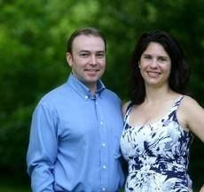 A Couple Smiling Together. Shop Wedding Registries at McAdams' Ltd., a Gift Store in Columbia, MO.