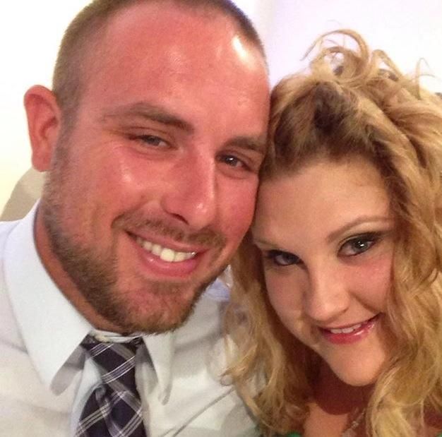 A Couple Smiling Together. Shop Wedding Registries at McAdams' Ltd., a Gift Store in Columbia, MO.