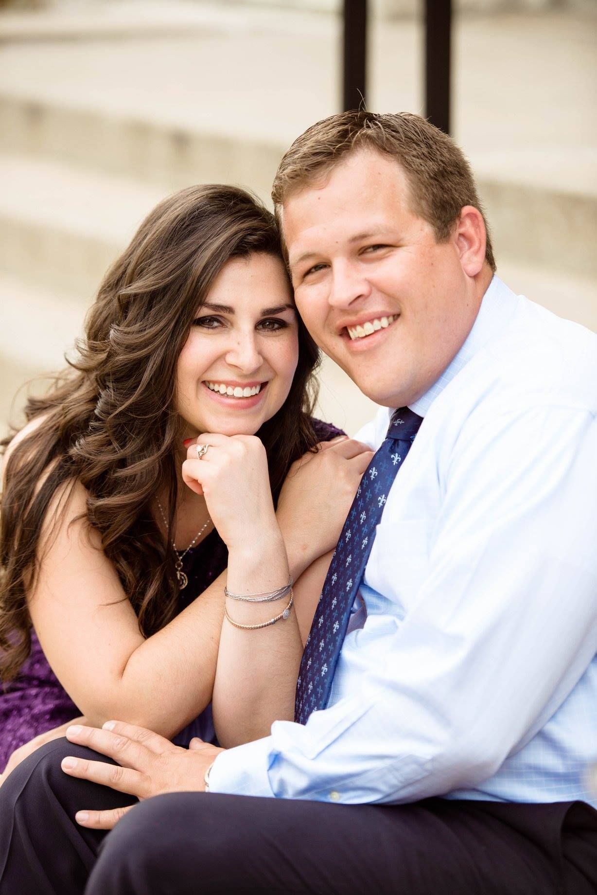 A Couple Smiling Together. Shop Wedding Registries at McAdams' Ltd., a Gift Store in Columbia, MO.
