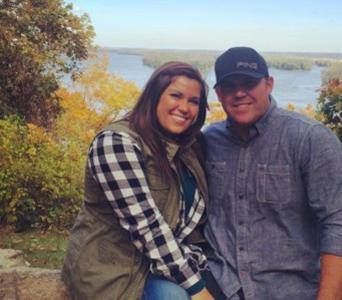 A Couple Smiling Together. Shop Wedding Registries at McAdams' Ltd., a Gift Store in Columbia, MO.
