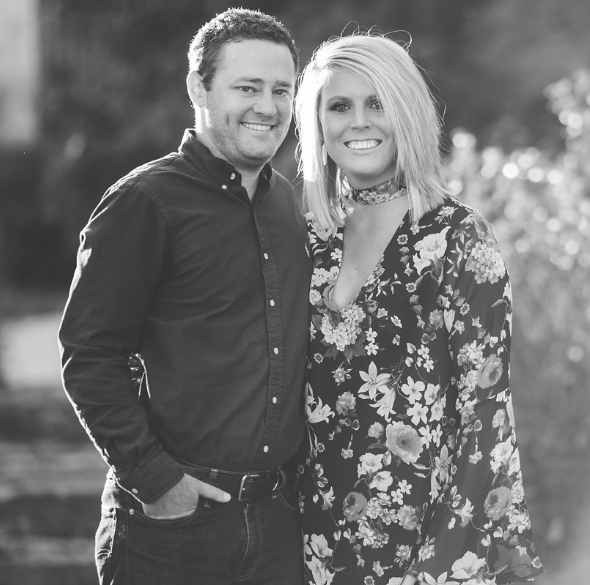 A Couple Smiling Together. Shop Wedding Registries at McAdams' Ltd., a Gift Store in Columbia, MO.
