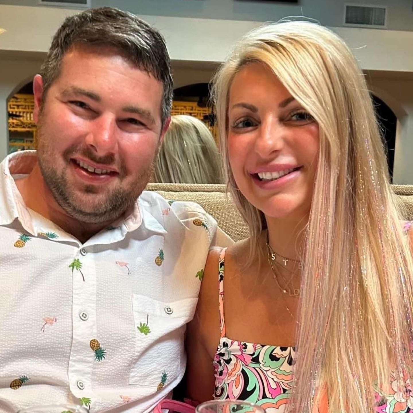 A Couple Smiling Together. Shop Wedding Registries at McAdams' Ltd., a Gift Store in Columbia, MO.