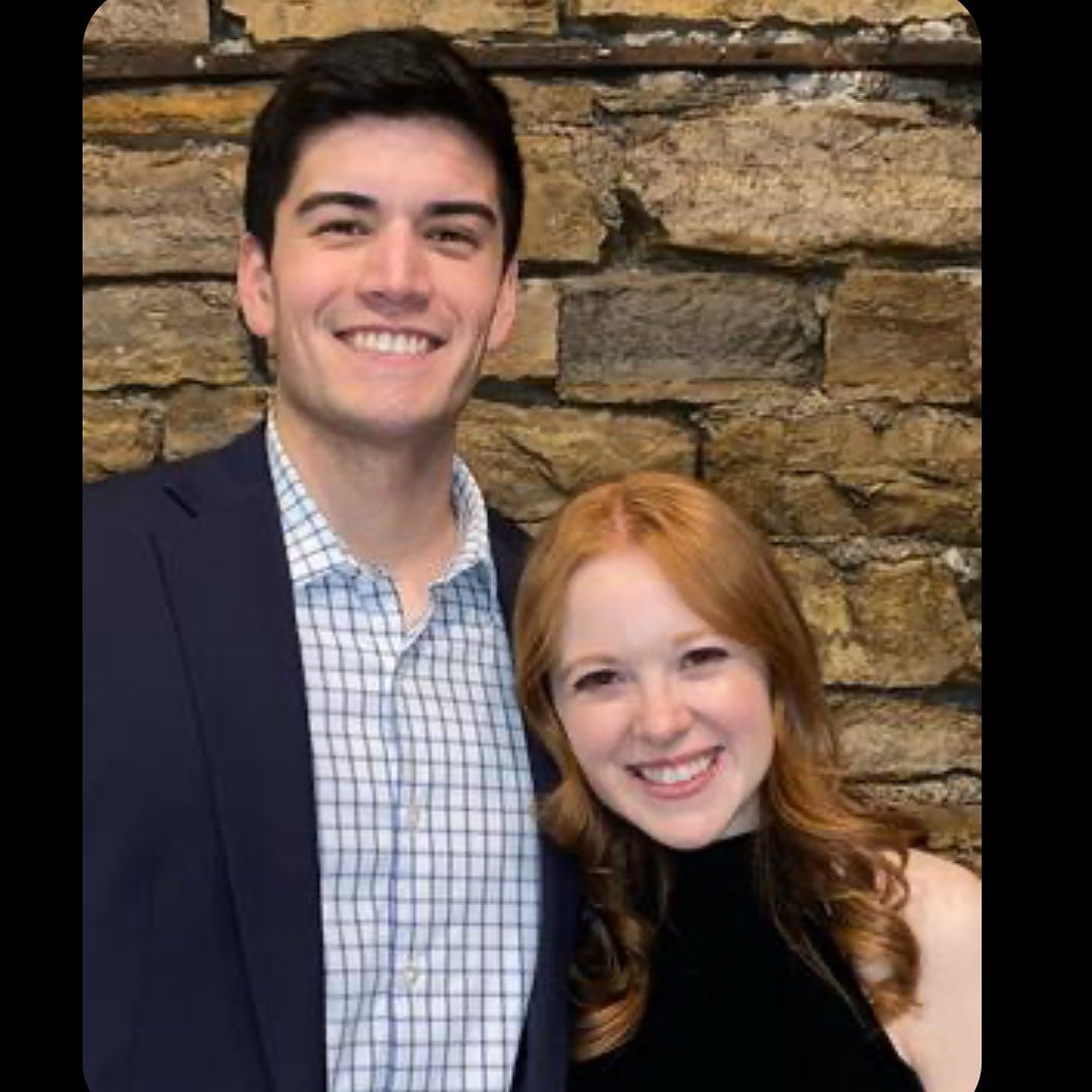 A Couple Smiling Together. Shop Wedding Registries at McAdams' Ltd., a Gift Store in Columbia, MO.
