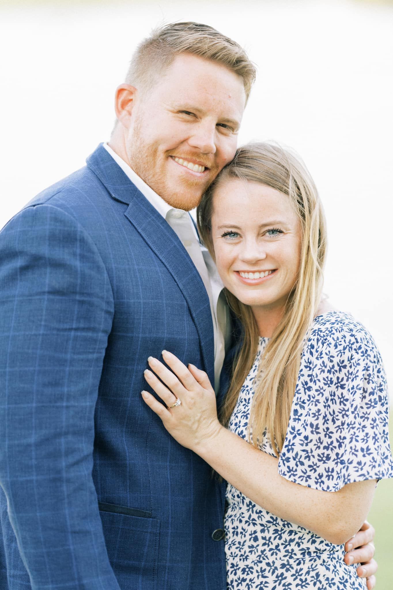A Couple Smiling Together. Shop Wedding Registries at McAdams' Ltd., a Gift Store in Columbia, MO.