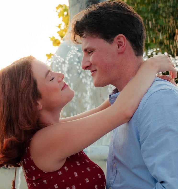 A Couple Smiling Together. Shop Wedding Registries at McAdams' Ltd., a Gift Store in Columbia, MO.