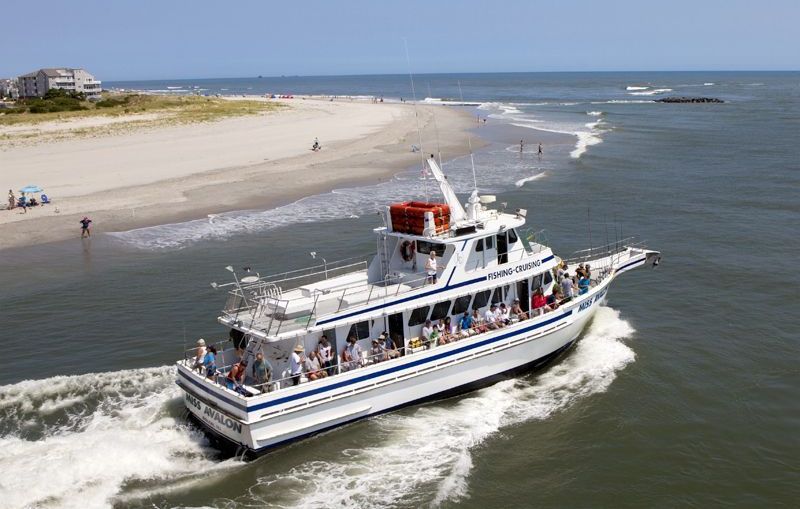 An aerial view of a boat in the ocean