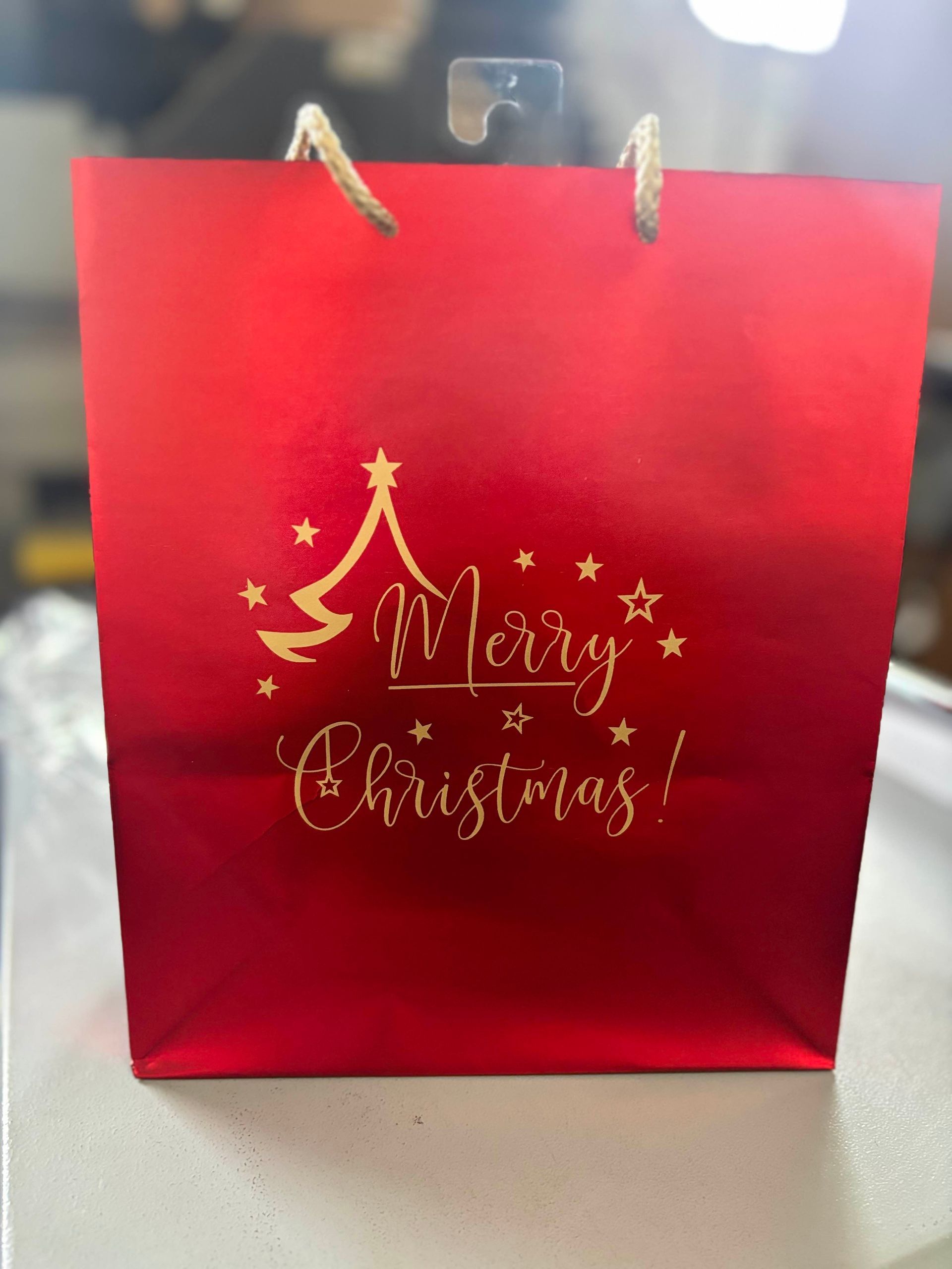 Borsa regalo rossa con scritta 