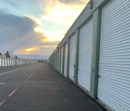 Row of drive-up storage units with roll-up doors at Lake Mead Pkwy