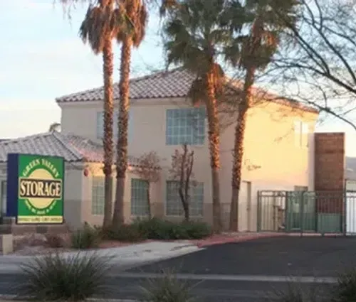Green Valley Storage Windmill office with palm trees on Windmill Pkwy in Henderson, NV