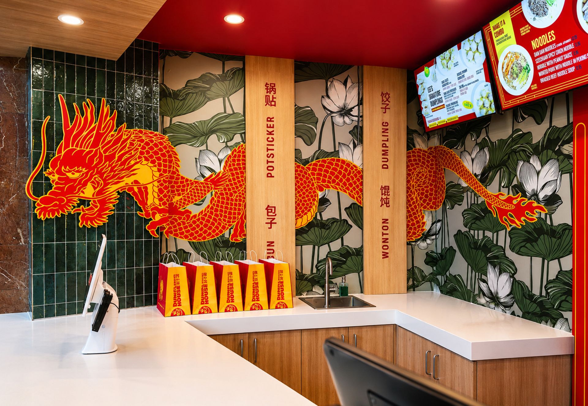 Bright Chinese restaurant counter with dragon wall art, red ceiling, and menu screens
