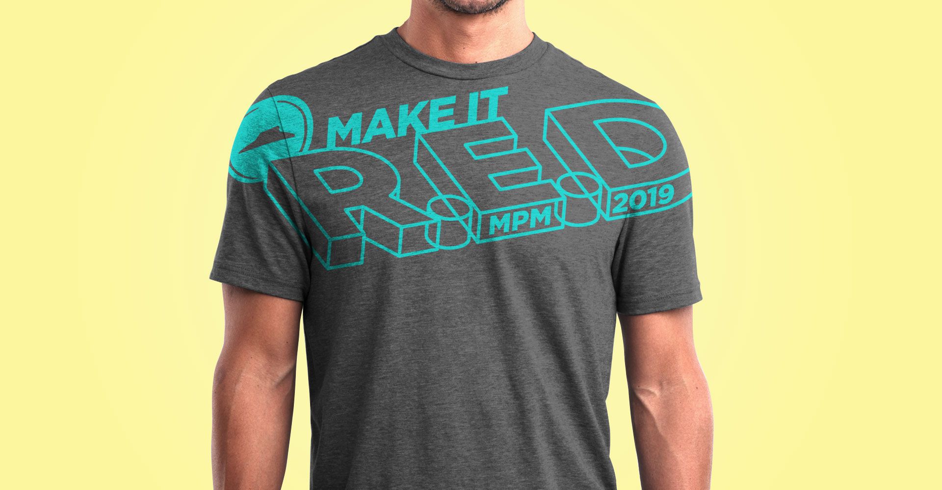 A man is wearing a t-shirt that says `` make it red ''.