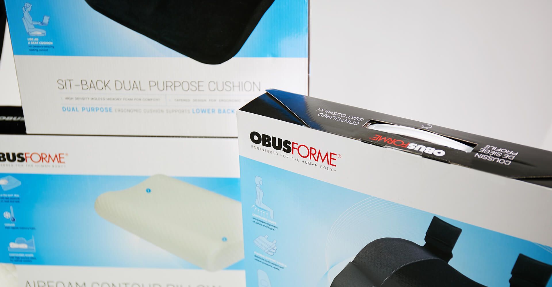 A stack of boxes with one that says ' obusdrive ' on it.