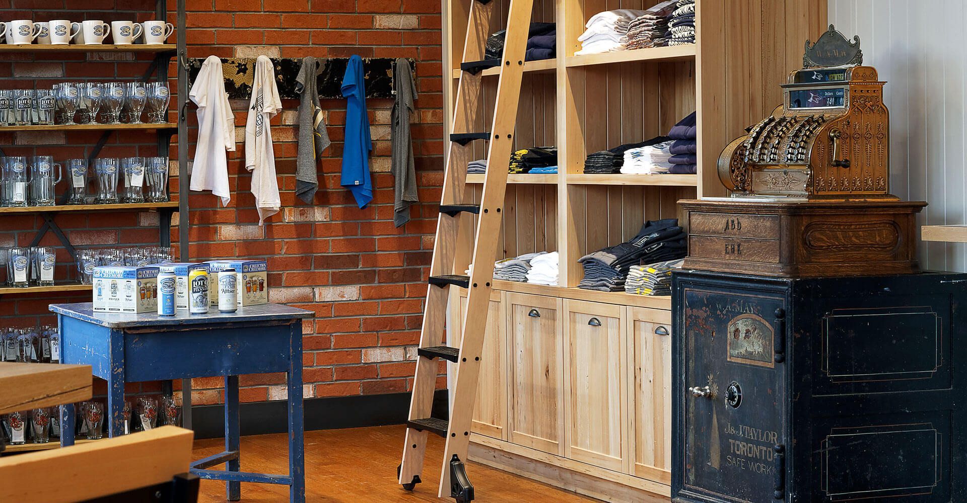 A store with a blue table and a cash register