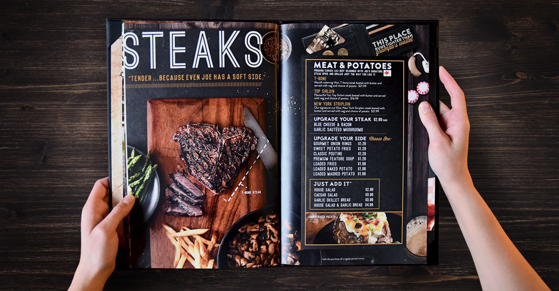 A person is holding a menu that says steaks on it