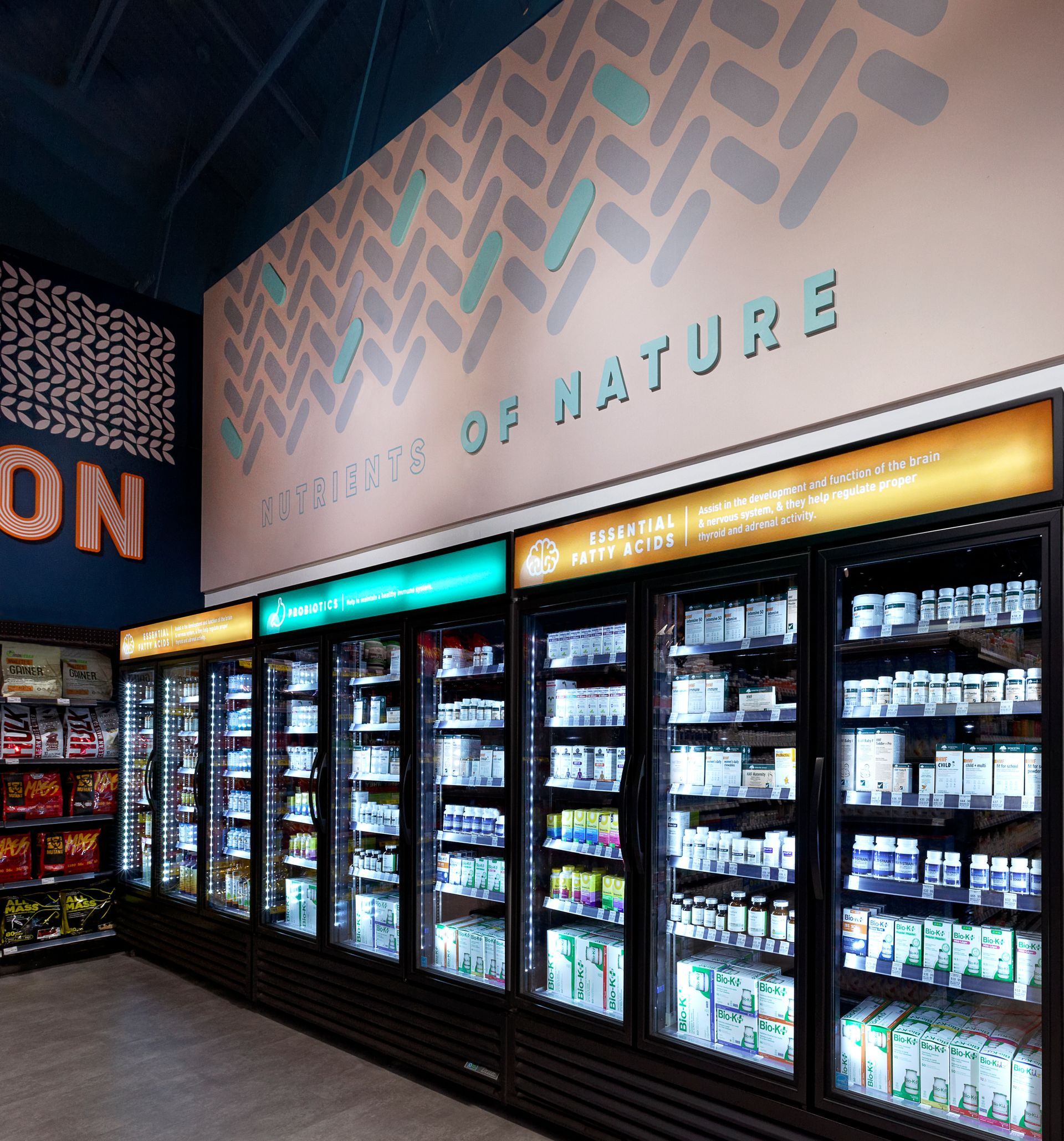 The inside of a grocery store with a sign that says 