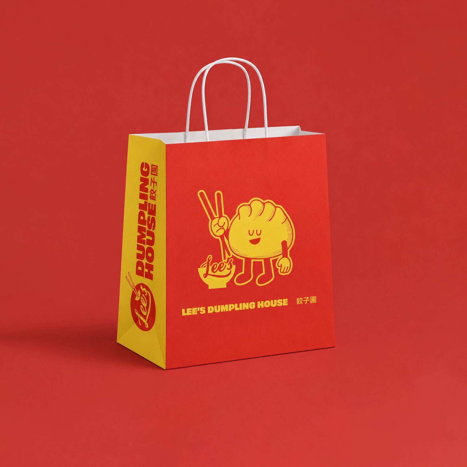 Red shopping bag with yellow cartoon logo and text on a red background