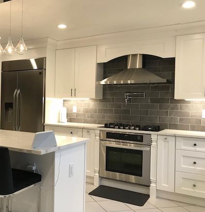 Contemporary Traditional Kitchen Remodel by American Home Remodeling project photo