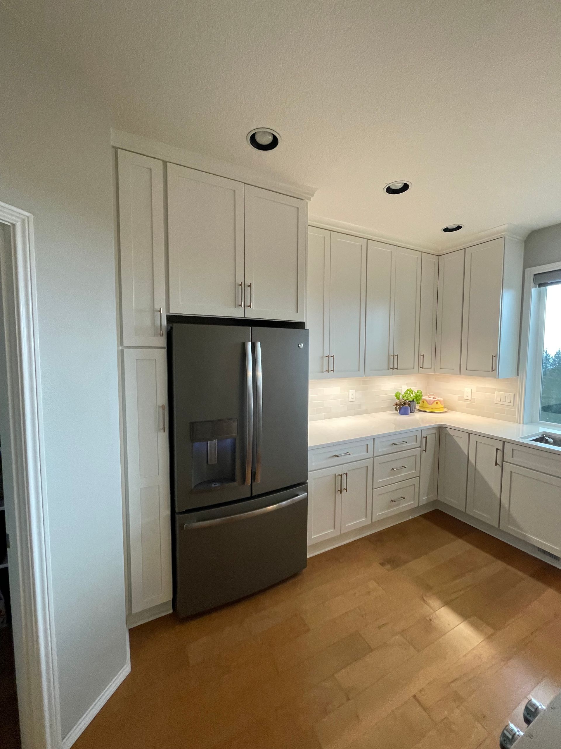 White Shaker Kitchen With Can Down Lights