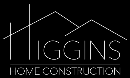 A logo for higgins home construction with a mountain in the background.