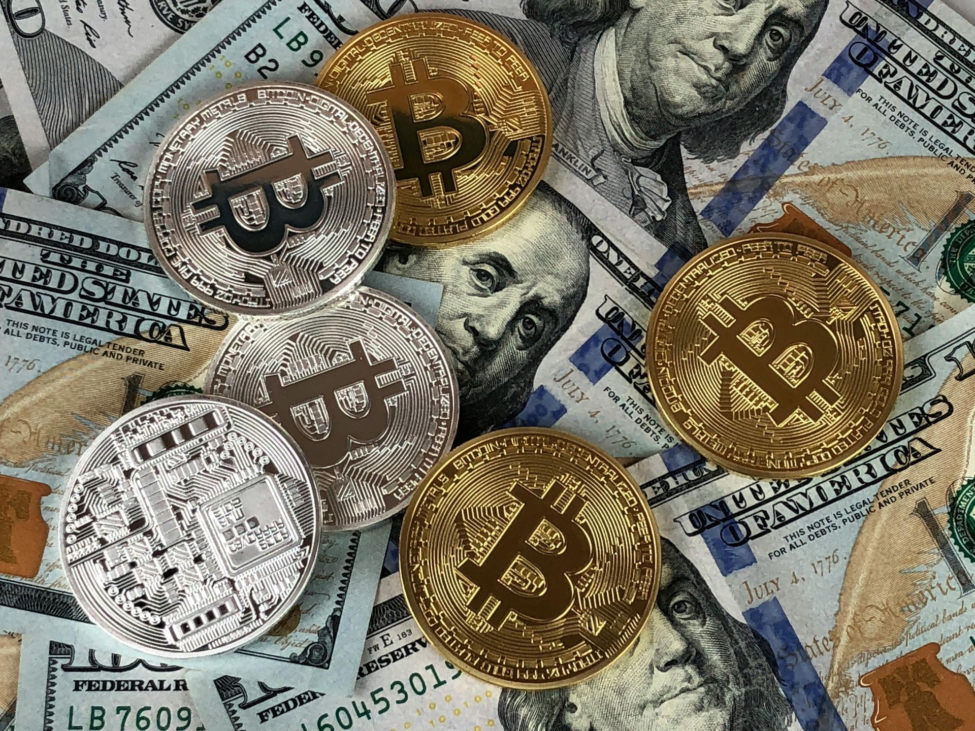A pile of money and coins with the letter b on them. Google PPC