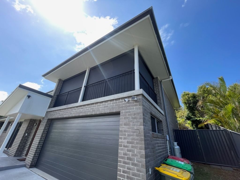 Blinds On A Second Floor Building