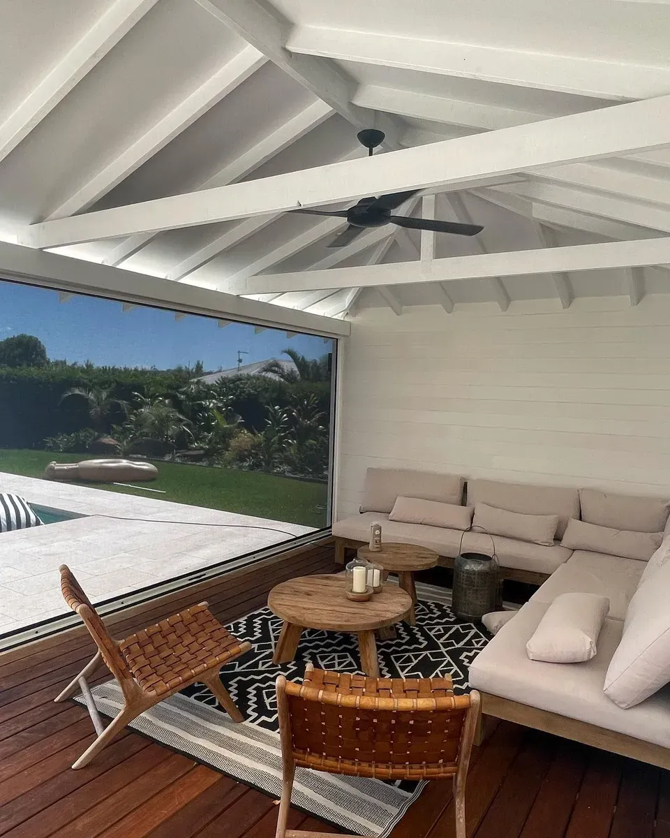 A Living Room With a Couch, Chairs, Tables and a Ceiling Fan — Dennys Upholstery & Outdoor Blinds In South Lismore, NSW