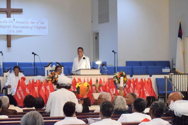 Annual Session meeting, with a speaker at the pulpit.