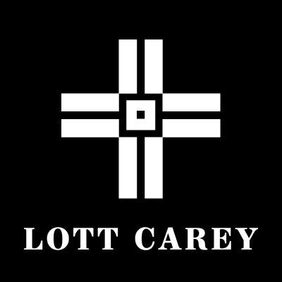 Black-and-white LOTT CAREY logo with a cross-like geometric symbol above the text