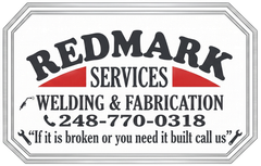 Redmark Services welding and fabrication sign with phone number 248-770-0318 and slogan text