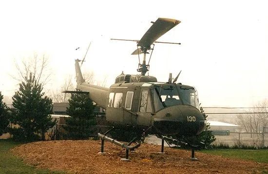 A military helicopter with the number 130 on it