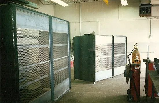 A room with a fire extinguisher in the middle of it
