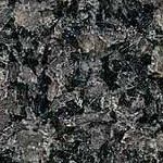 A close up of a black and white rock texture.