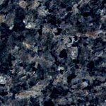 A close up of a blue granite counter top.
