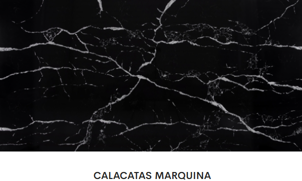 A close up of a black and white marble counter top