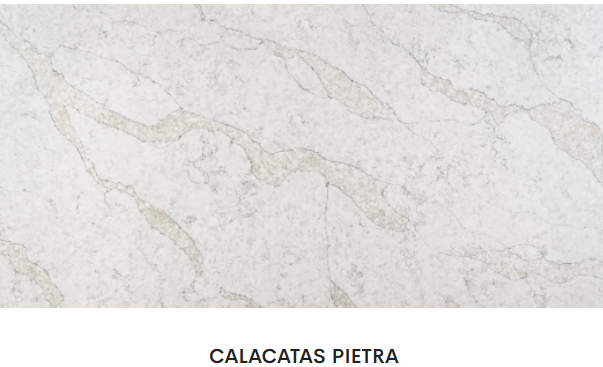 A white marble counter top with the word calacatas pietra on the bottom