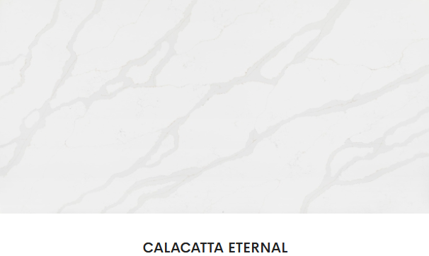 A close up of a white marble slab with the words calacatta eternal written on it.