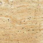 A close up of a beige granite counter top.