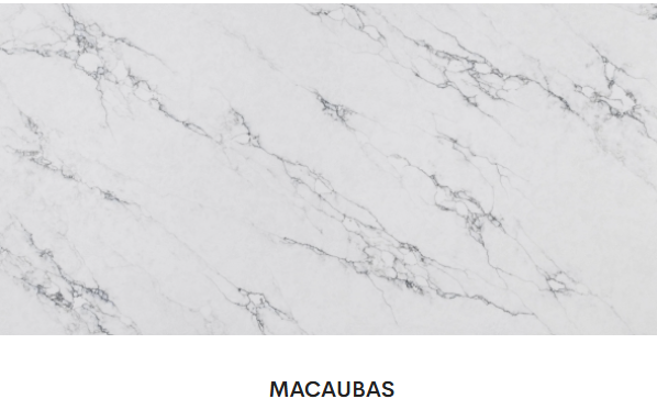 A close up of a white marble counter top.