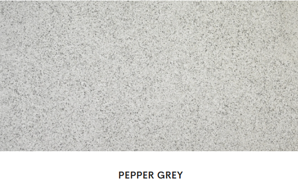 A close up of a pepper grey granite counter top.