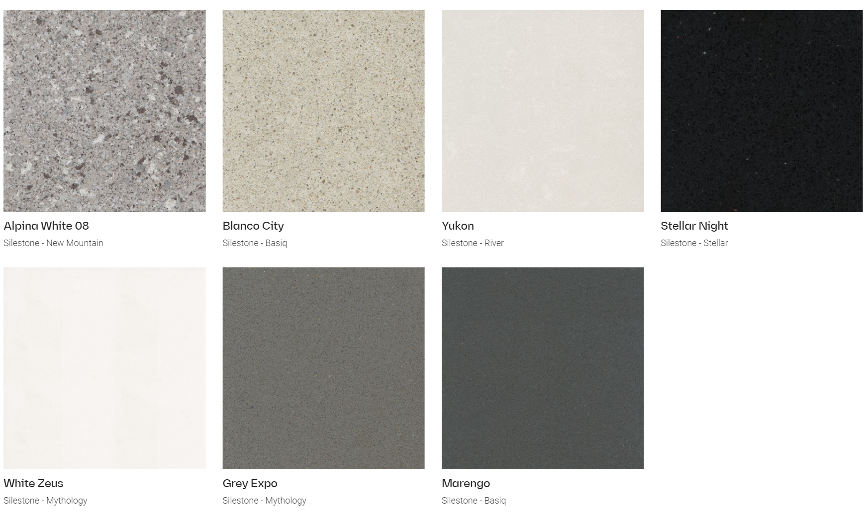 A display of different colored tiles including white and black