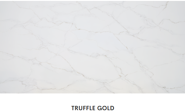 A close up of a white marble counter top with the words `` truffle gold '' written on it.