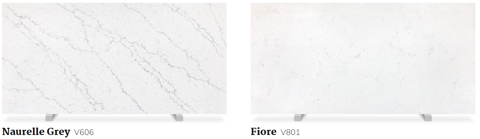 Two white marble slabs are sitting next to each other on a table.