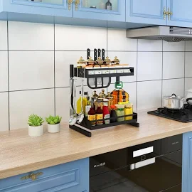 A kitchen counter with a spice rack and bottles on it.