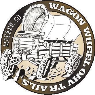 A logo for a company called wagon wheel trails