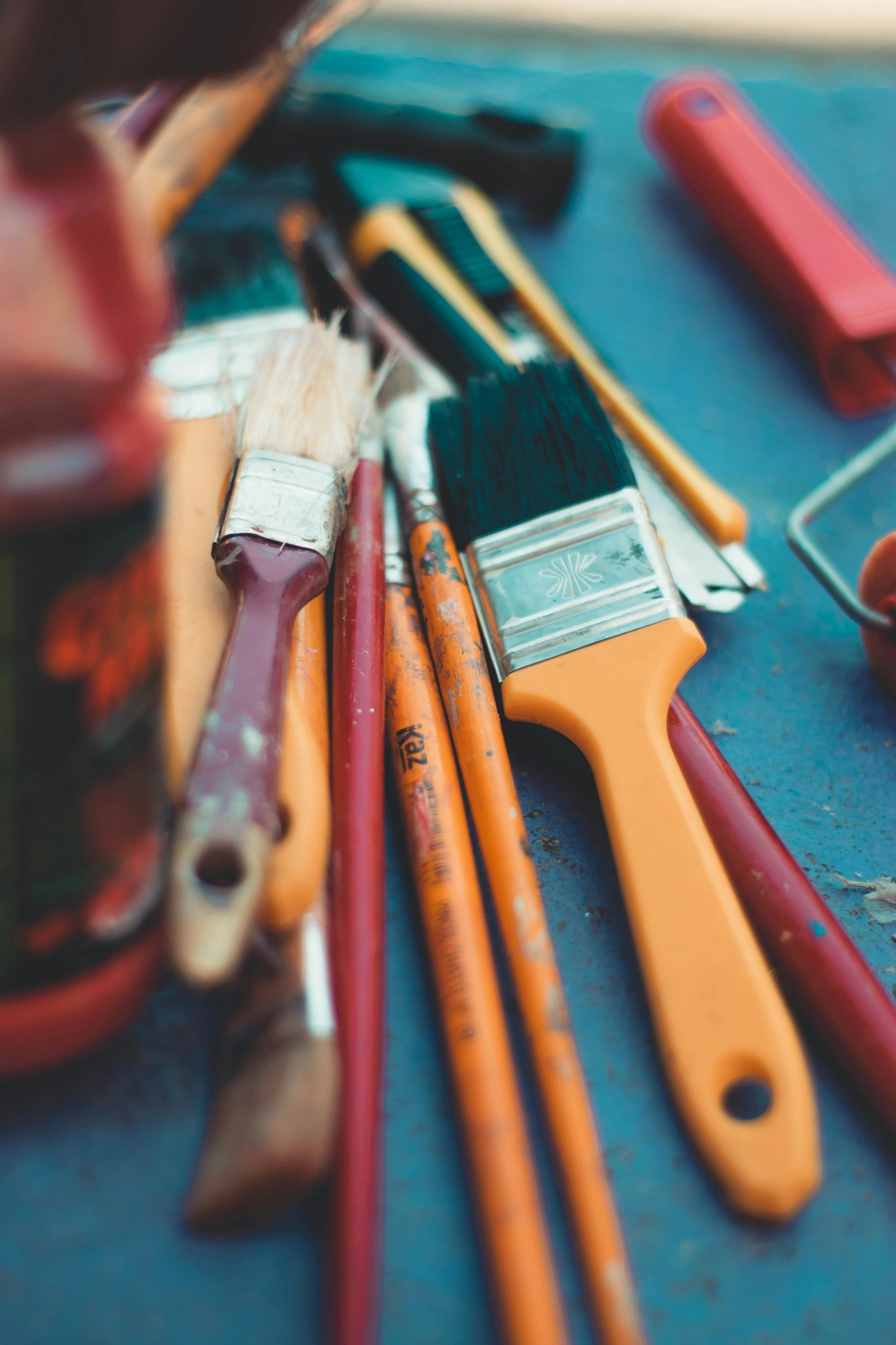 Close-up of various paint brushes.