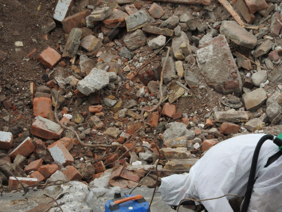 Worker with Vacuum Cleaner — Asbestos Removal in Bundaberg, QLD