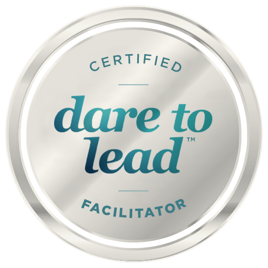 A silver certified dare to lead facilitator badge