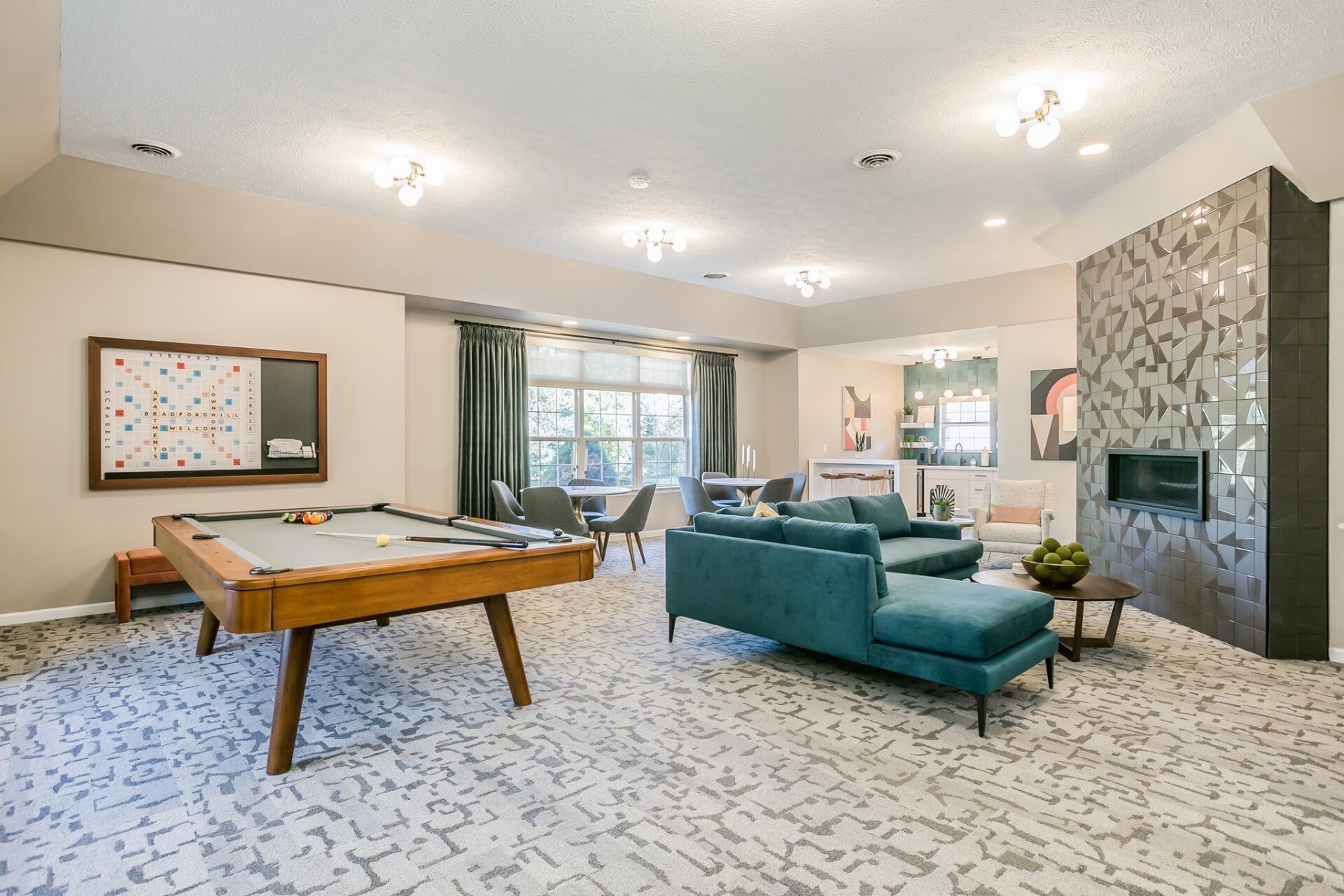 Clubhouse with fireplace and pool table