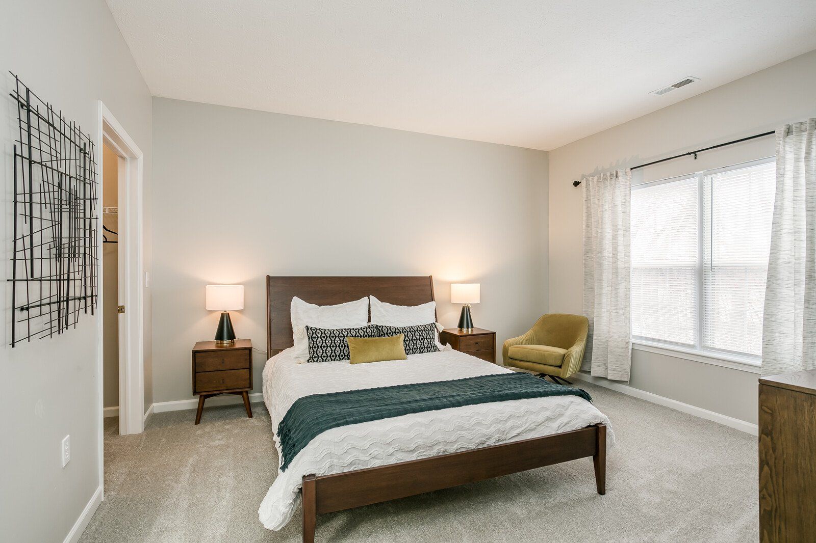 Carpeted Bedroom with Large Window