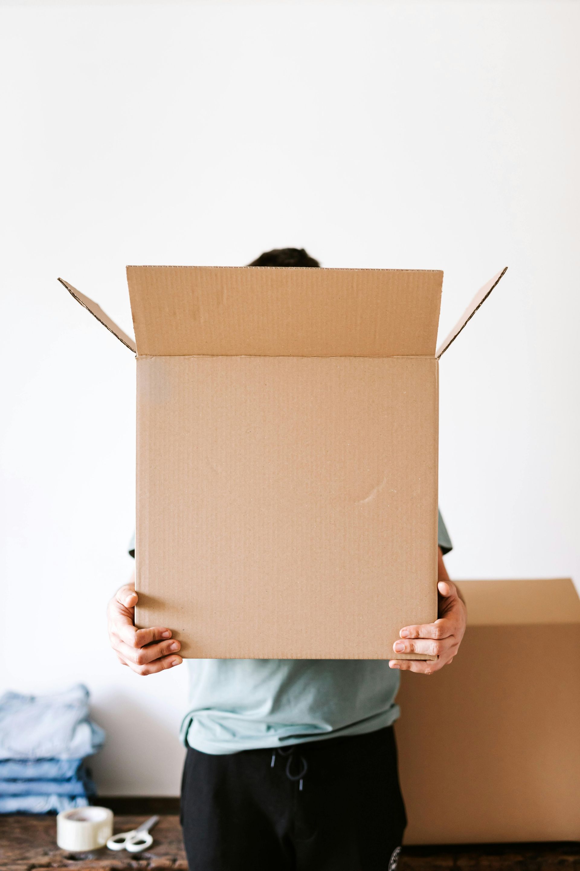 Boxes being moved and Move-out cleaning in Chicago.